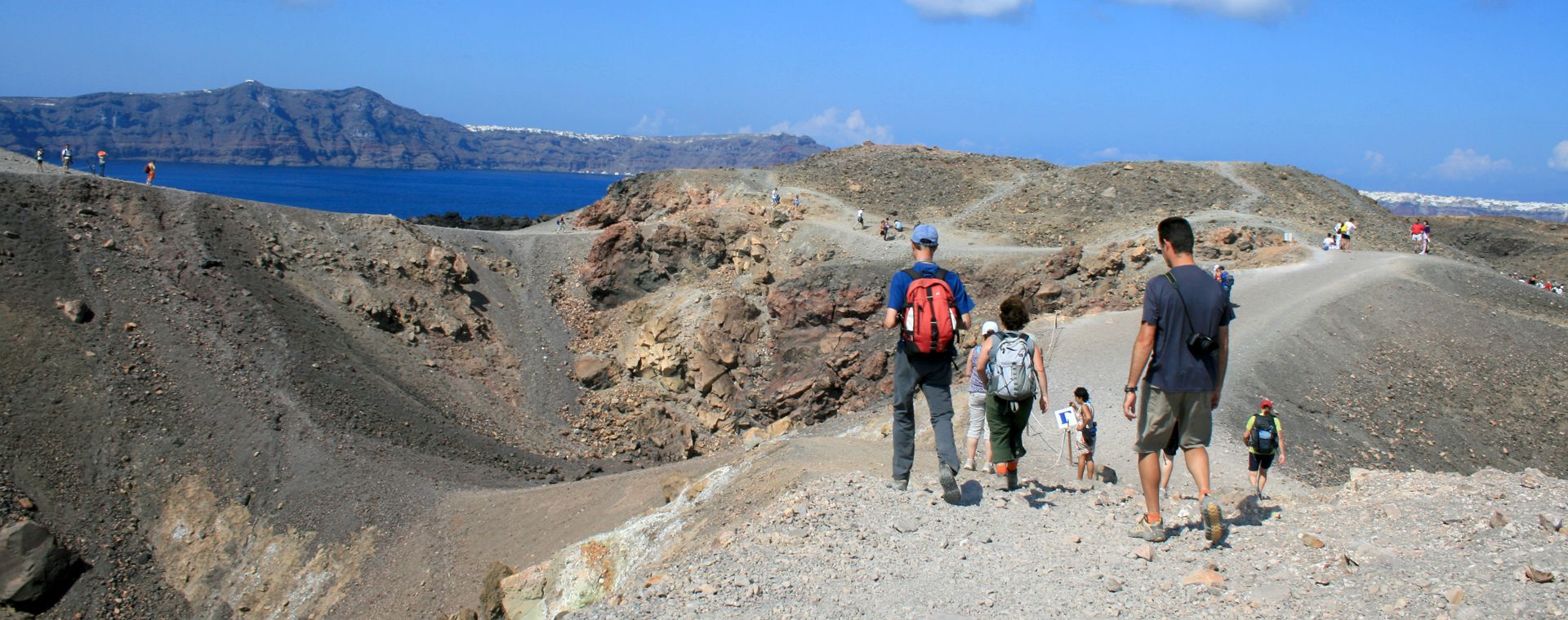 Hikers on the island of Thirasia in the Cyclades